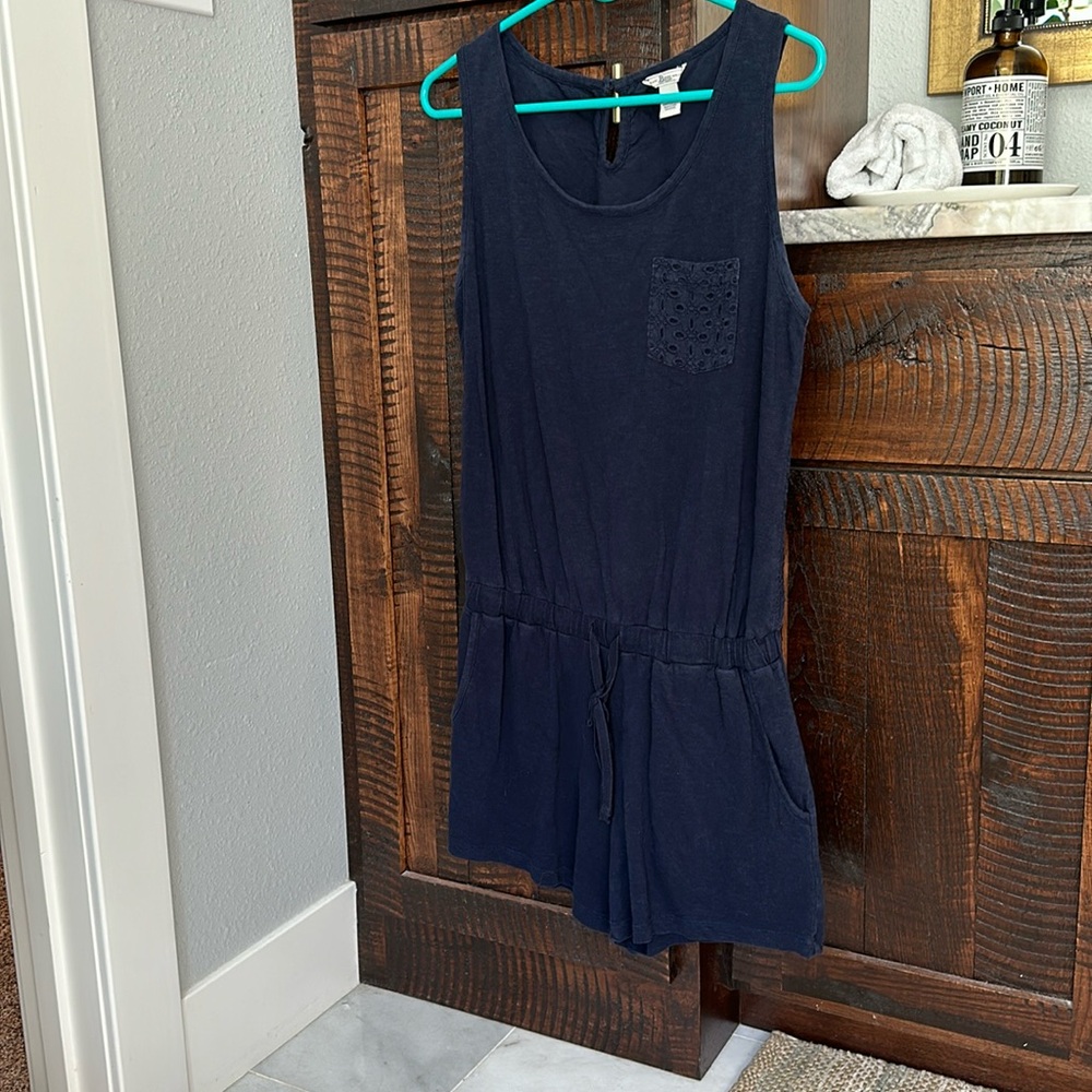 Sweet navy romper with eyelet detail